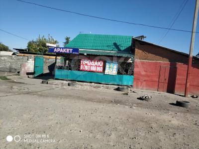 Продаю дом 20-ком., 580кв. м., этаж-1, 7-сот., стена кирпич, Ошский рынок.